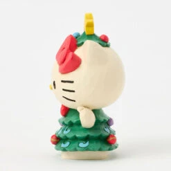 Enesco Jim Shore Sanrio Hello Kitty Christmas Tree Mini Figurine, 3.7" 8 Enesco Jim Shore Sanrio Hello Kitty Christmas Tree Mini Figurine, 3.7" -Hallmark Shop Hello Kitty in Christmas Tree Dress Mini Figurine 6017558 03