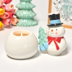 Peppermint Scented Ceramic Snowman Candle -Hallmark Shop Peppermint Scented Ceramic Snowman Candle HMSNWMN 06