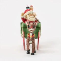 Enesco Jim Shore Rudolph Pulling Santa In Sleigh Figurine, 5" 10 Enesco Jim Shore Rudolph Pulling Santa In Sleigh Figurine, 5" -Hallmark Shop Rudolph the RedNosed Reindeer and Santa Figurine 6017194 04